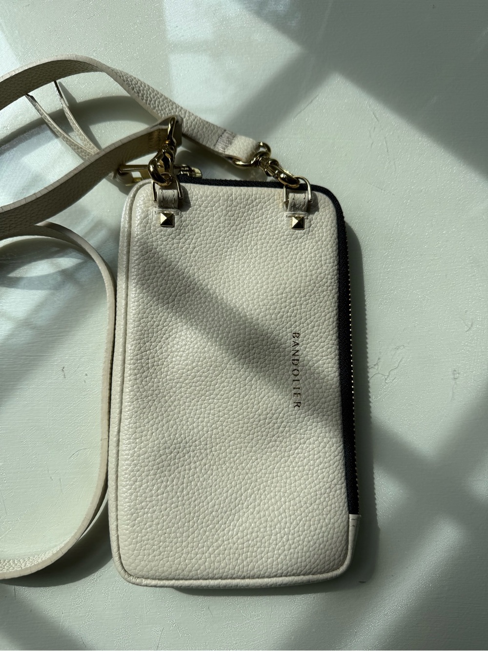 Bandolier Ivory White Crossbody Phone Bag Expanded Pouch with Strap